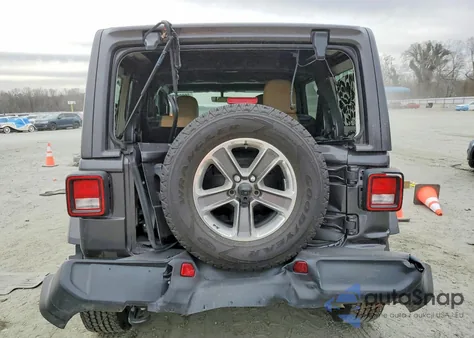 2022 Jeep Wrangler Unlimited Sahara z USA, uszkodzony, nr VIN 1C4HJXEN6NW134934